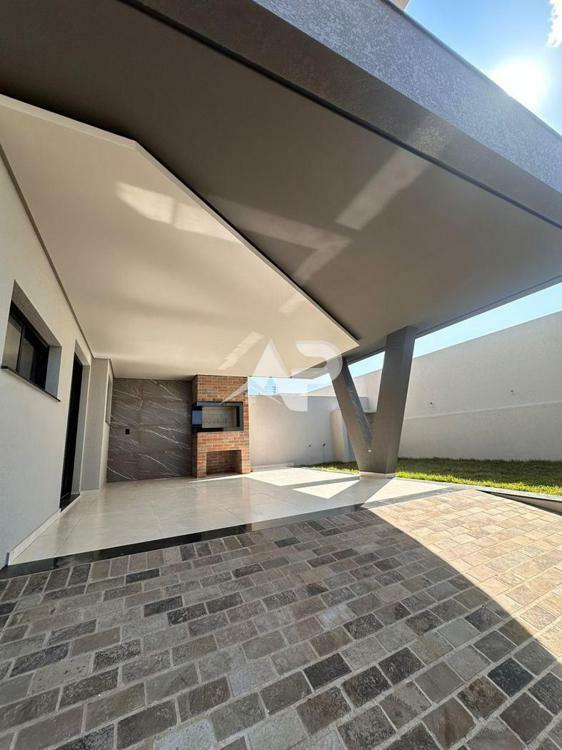 Garagem com churrasqueira