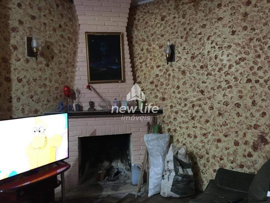 Sala de Estar com Lareira