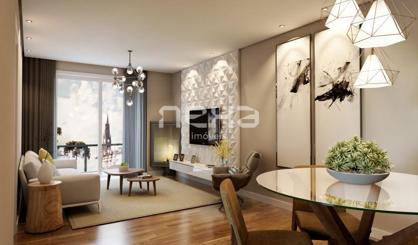 Living amplo com sacada e espera para lareira